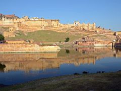 
Jaipur Amber Fort On The Hill Above Maotha Lake Early Morning
